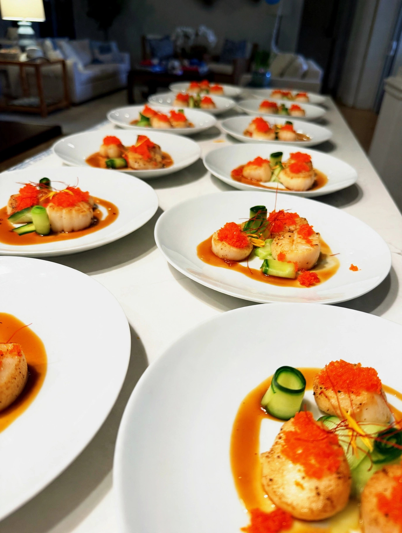 Seared scallop course, plated for the table