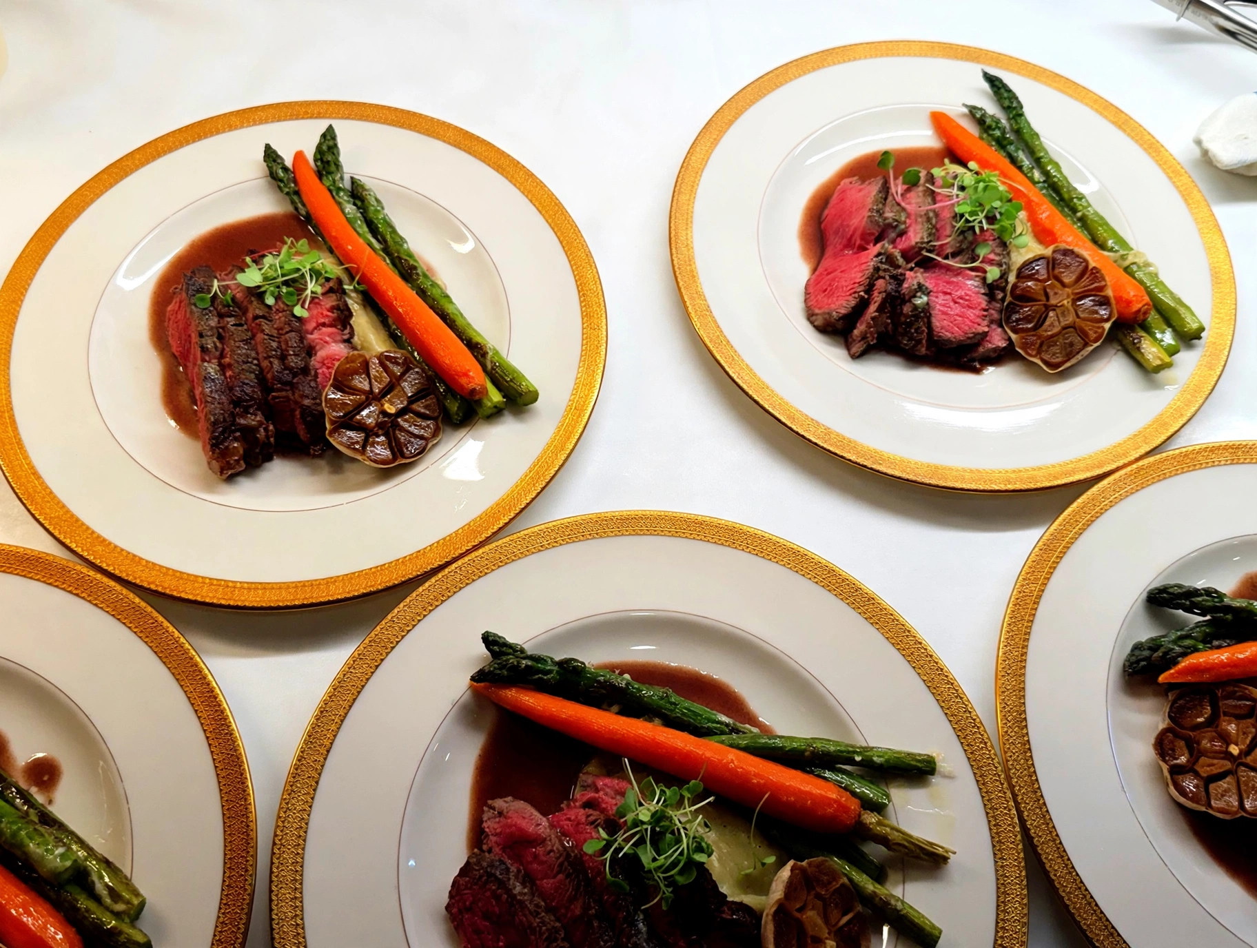 Plated beef tenderloin dinners at a private event